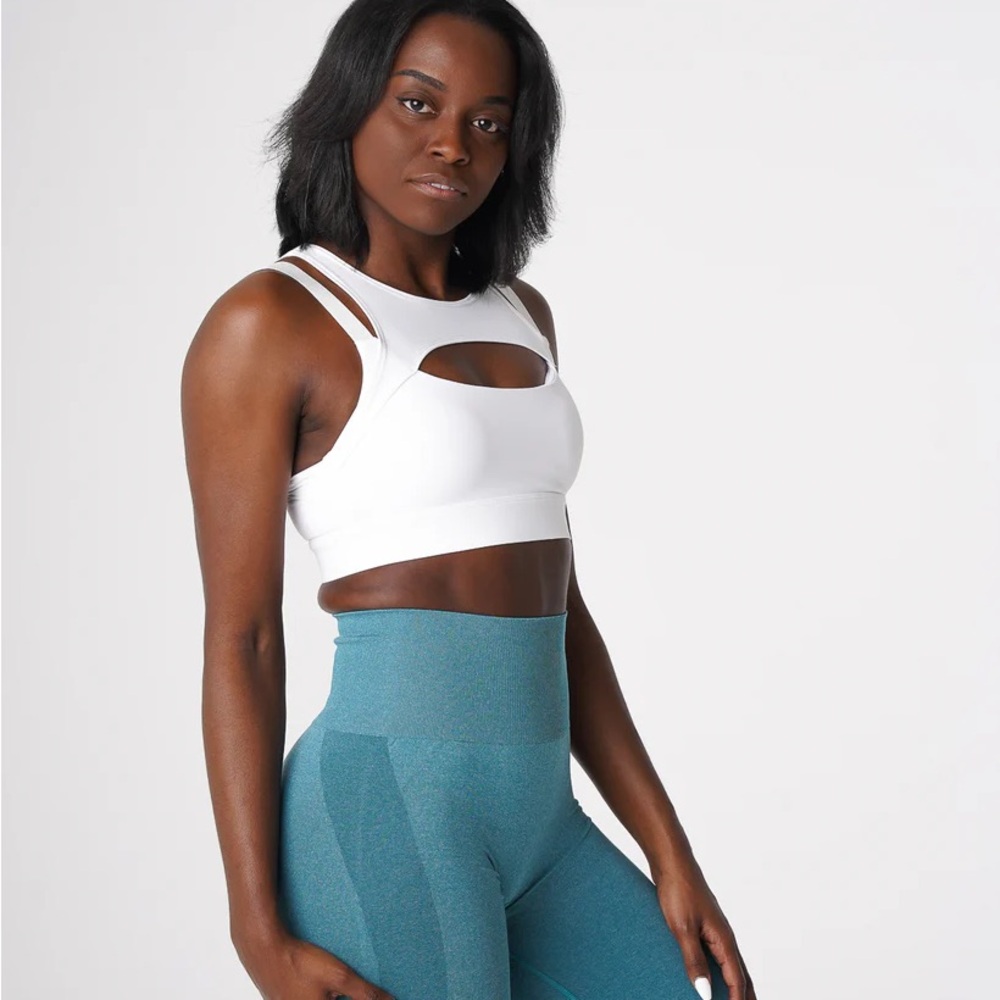 White Cutout Sports Bra and Teal Leggings